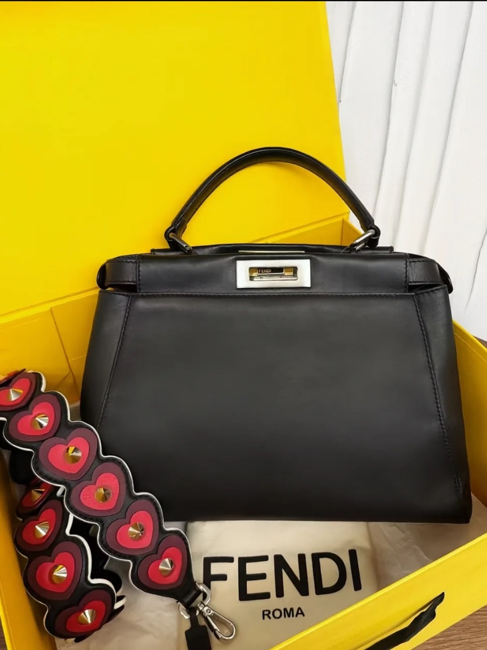Previously loved Fendi black Leather Med Peekaboo bag w limited edition strap.